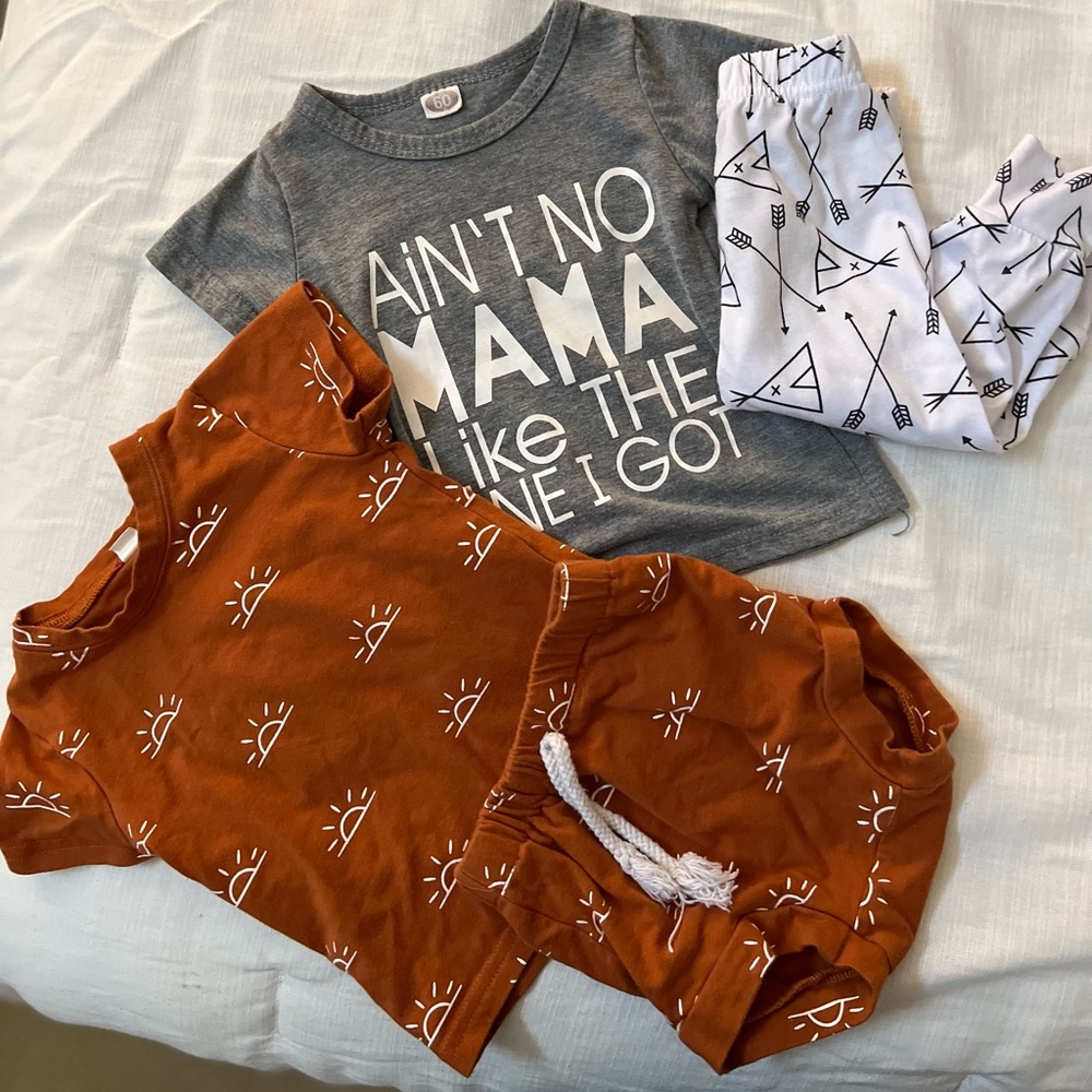 Two boutique style baby outfits